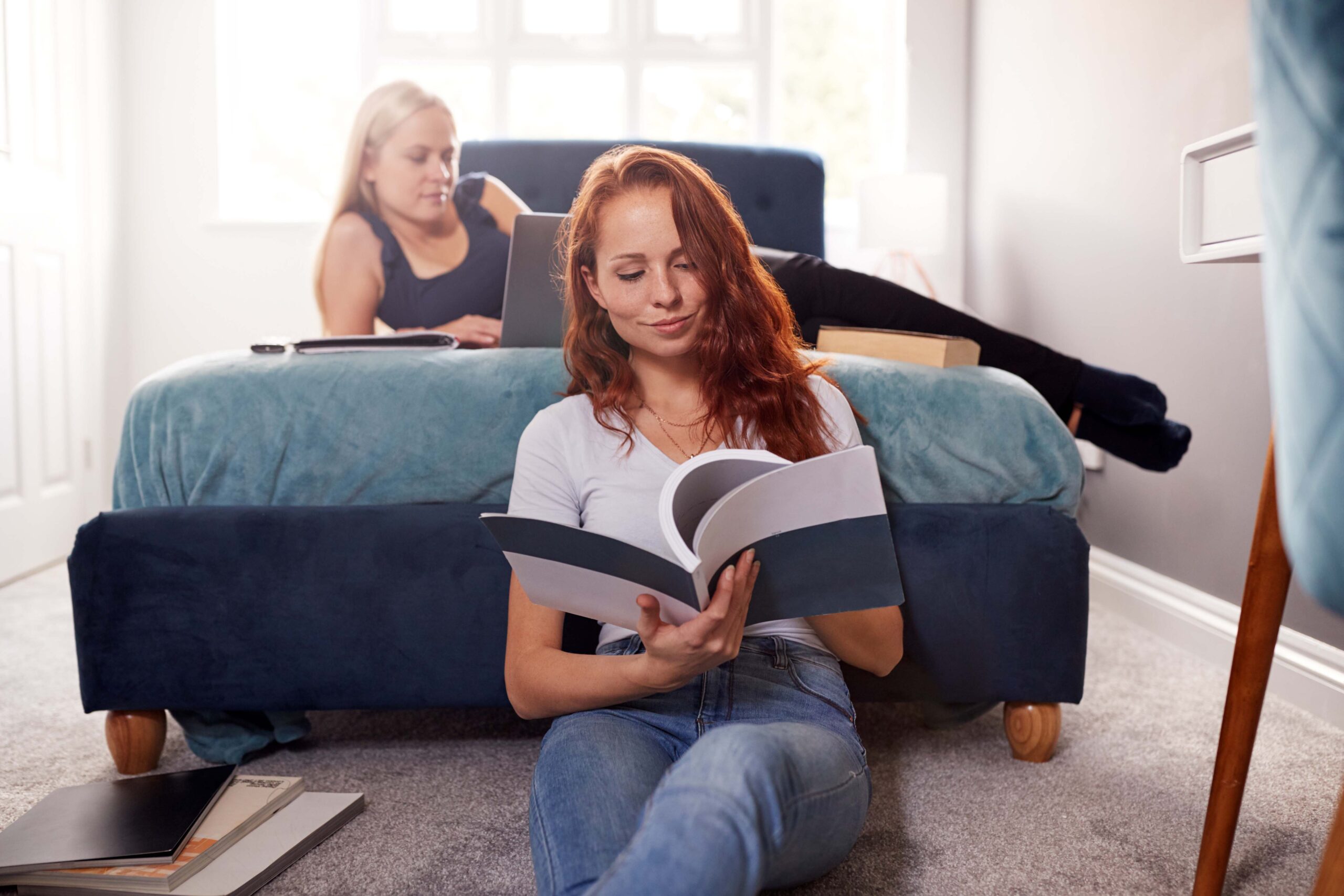 two-female-college-students-in-shared-house-bedroo-2021-08-26-16-14-45-utc-scaled